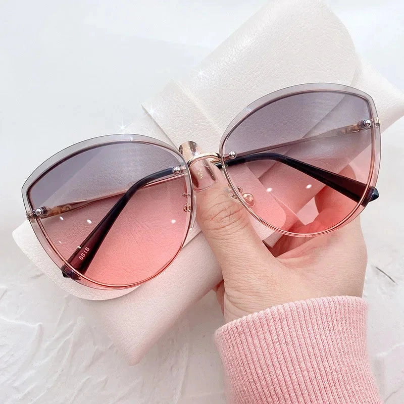 High Quality Women's Oval Rimless Sunglasses Lady Metal Cay Eye Shades for Women