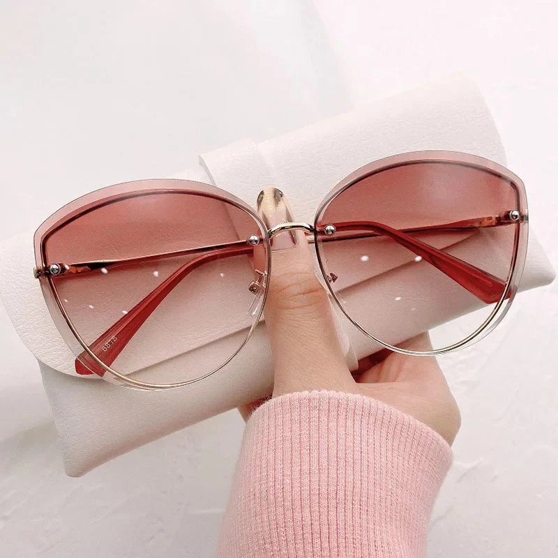 High Quality Women's Oval Rimless Sunglasses Lady Metal Cay Eye Shades for Women