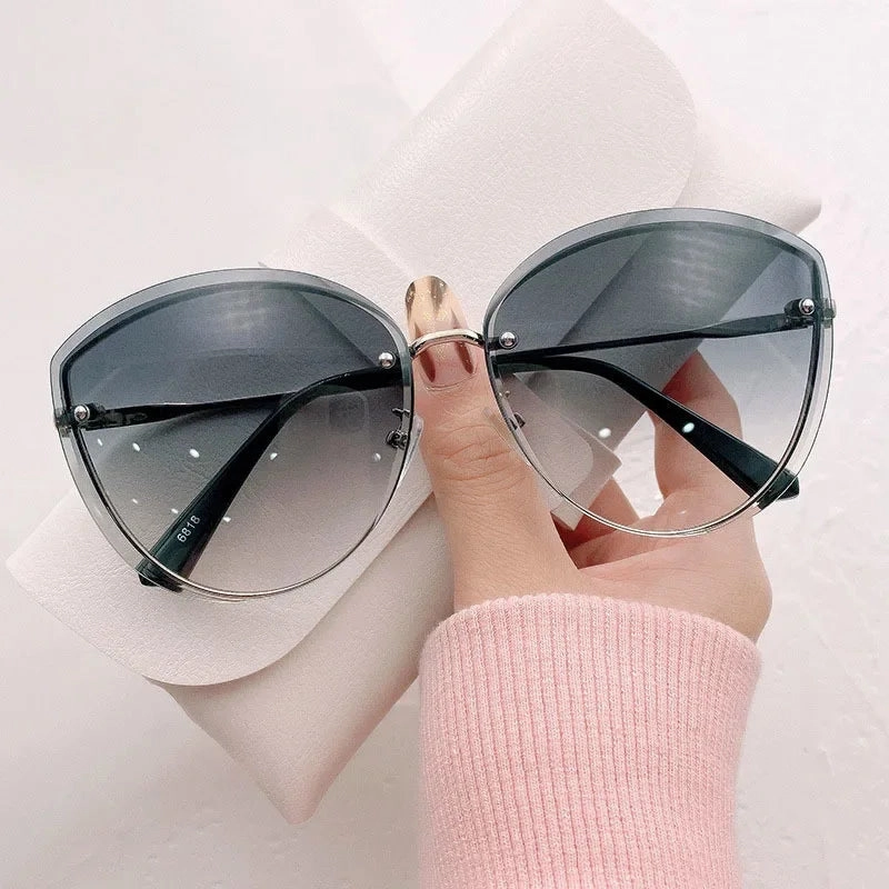 High Quality Women's Oval Rimless Sunglasses Lady Metal Cay Eye Shades for Women