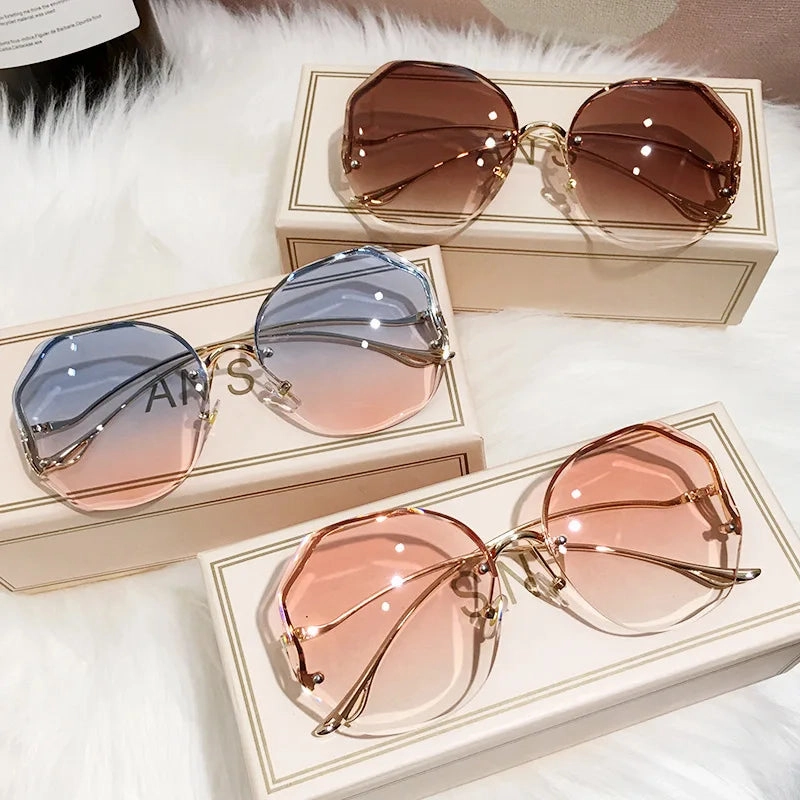 Luxury Round Gradient Sunglasses Women UV400 Metal Temples